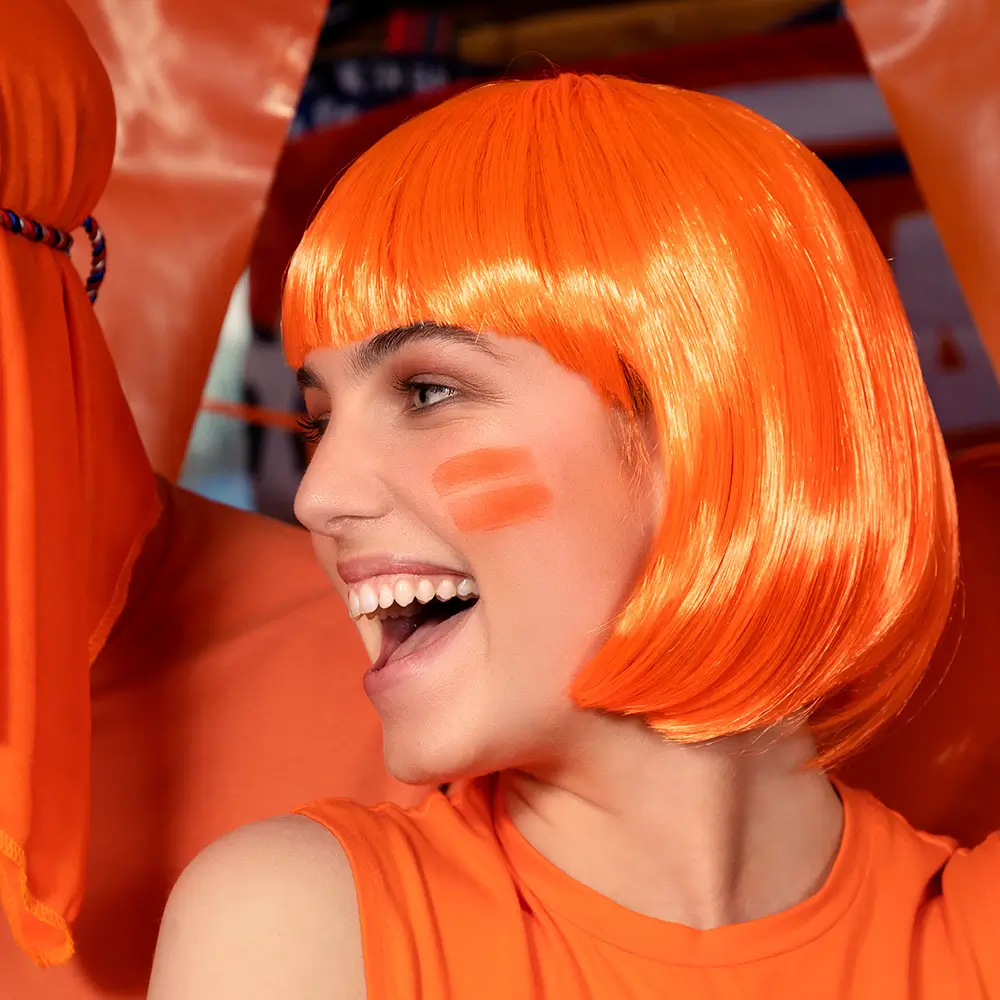 Fluorescerend oranje cabaretpruik